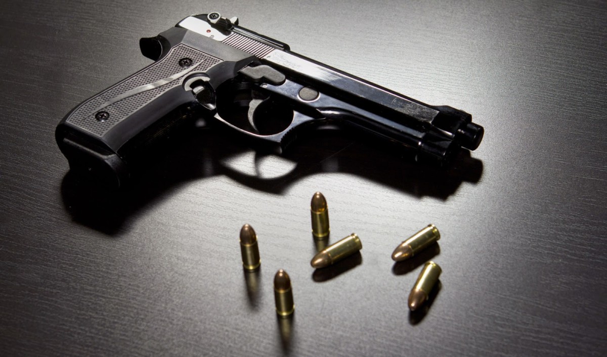 Error en aplicación de la ley penal en el delito de extorsión agravada y tenencia ilegal de municiones
